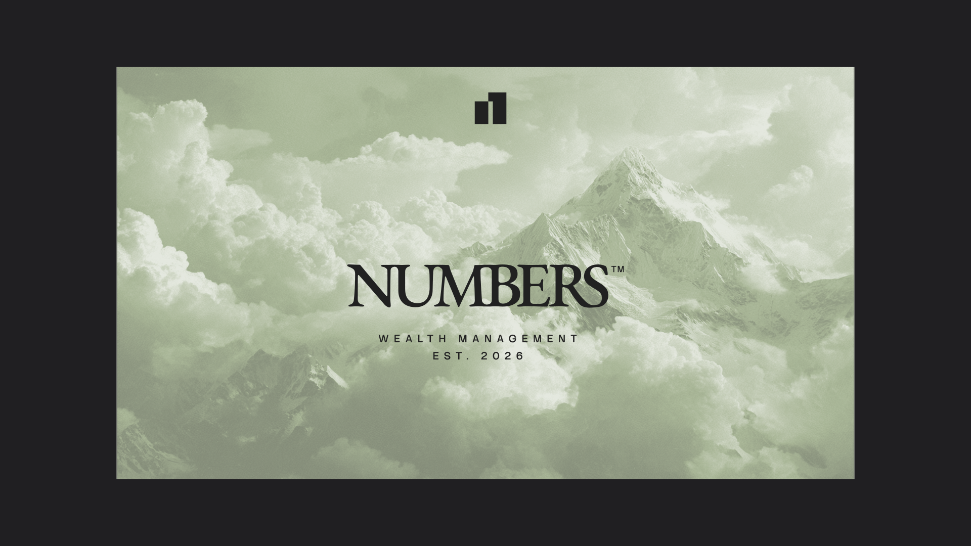 Numbers wordmark over a misty green mountain range